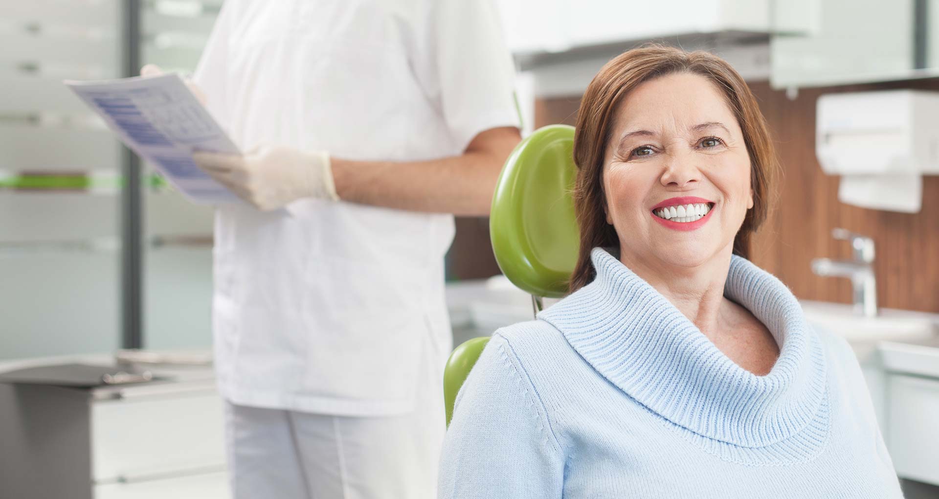 woman-dental-implants-doctors-office