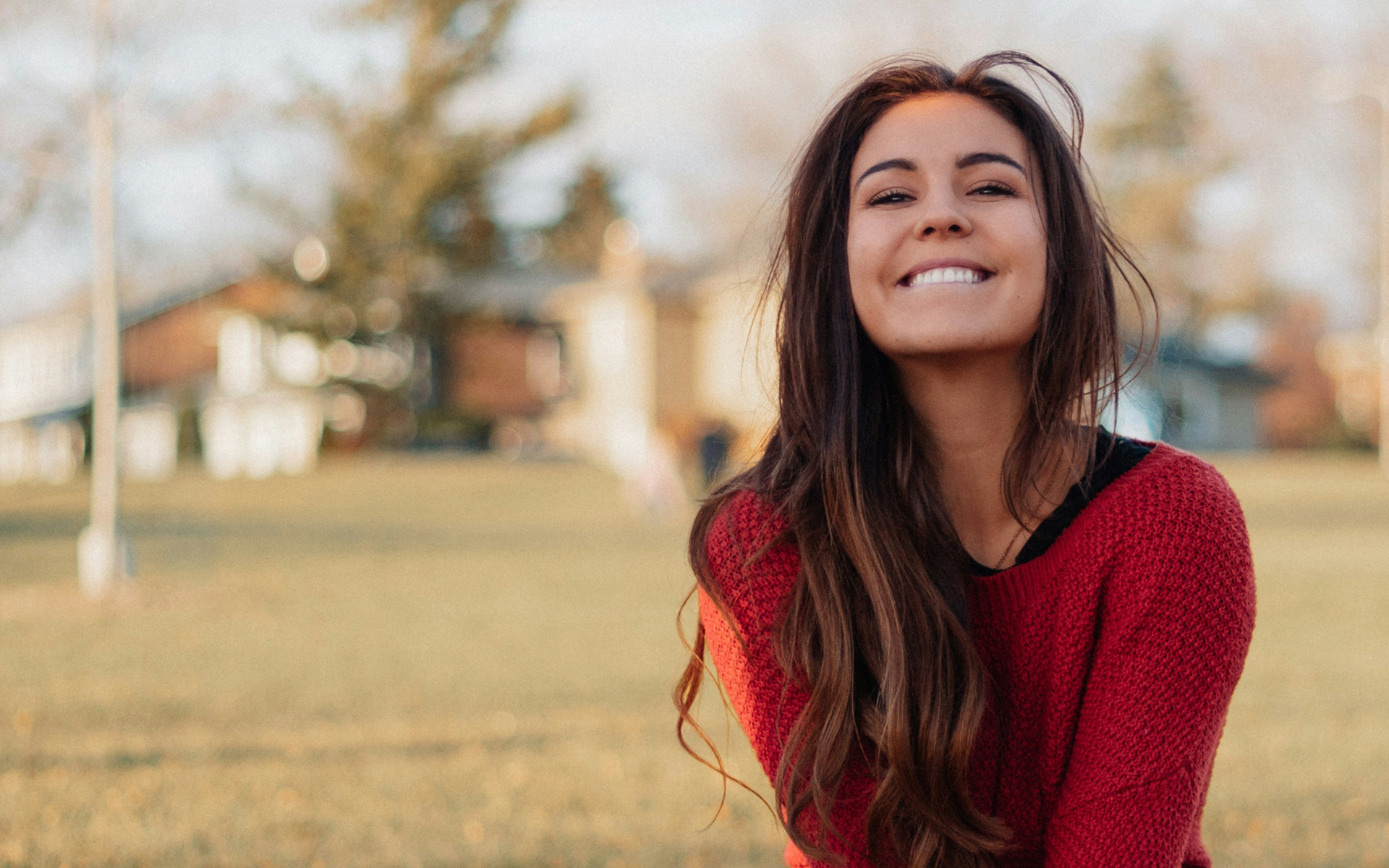 straighter_smile Girl happy smiling at the park, showing a perfect straight smile.